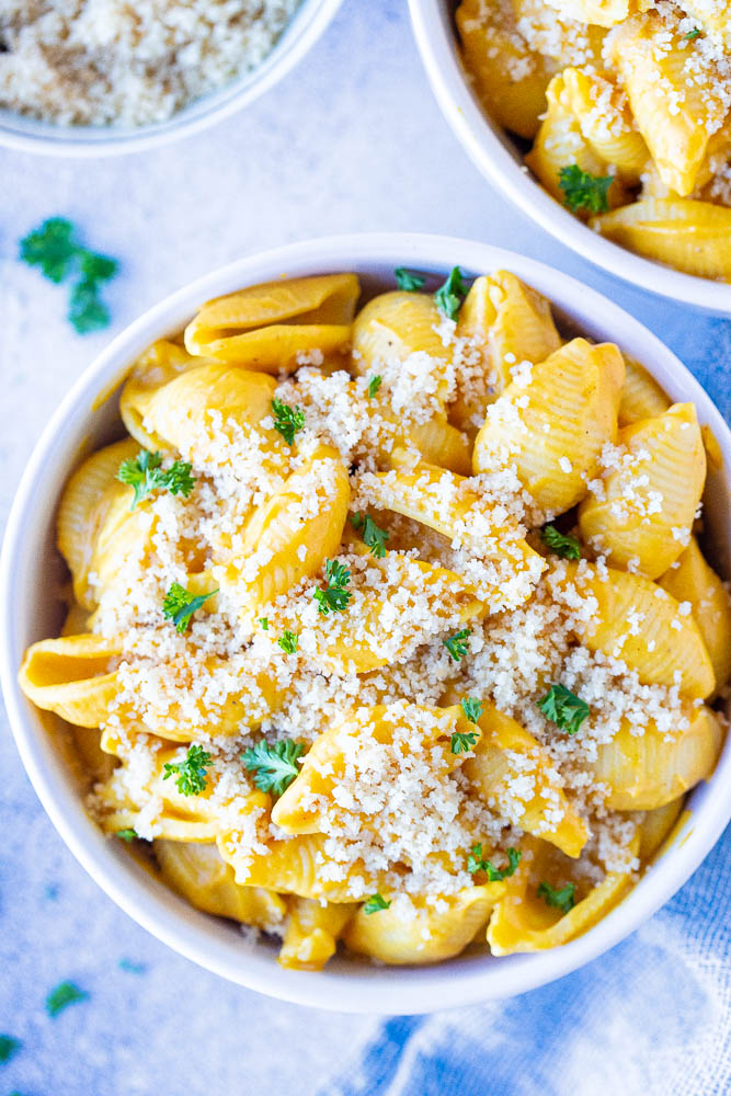 Butternut Squash Mac and Cheese in a bowl with bread crumbs