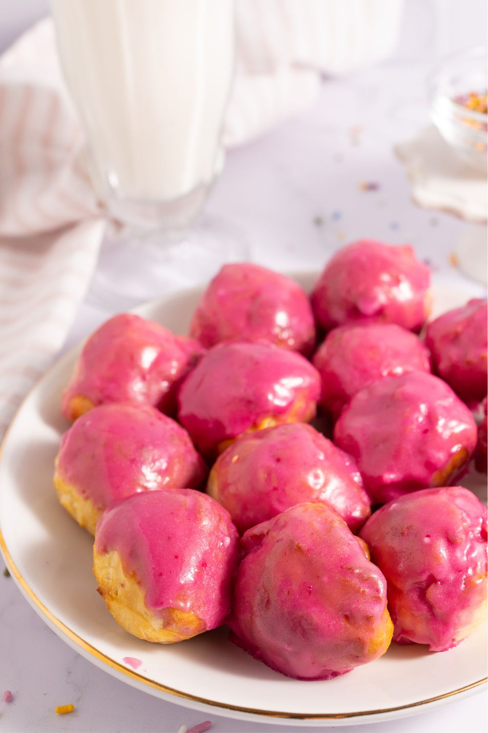 Air Fryer Donut Holes with Pink Icing